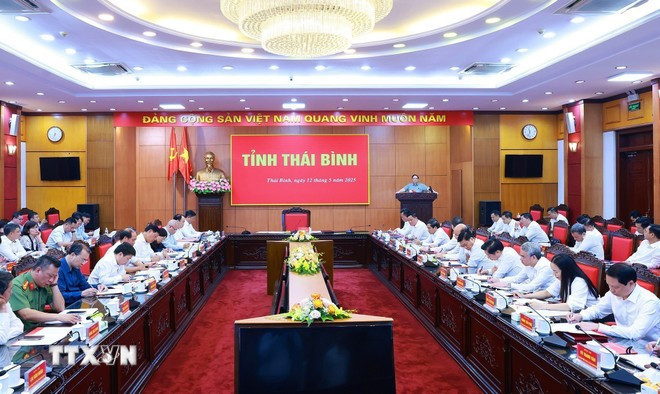 En la reunión (Foto: VNA)