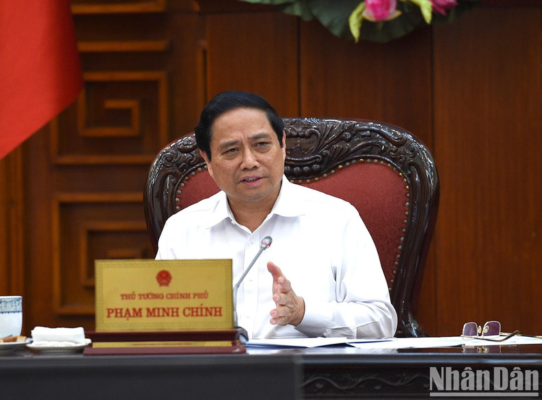 El primer ministro vietnamita, Pham Minh Chinh, habla en el acto. El primer ministro vietnamita, Pham Minh Chinh, habla en el acto.
