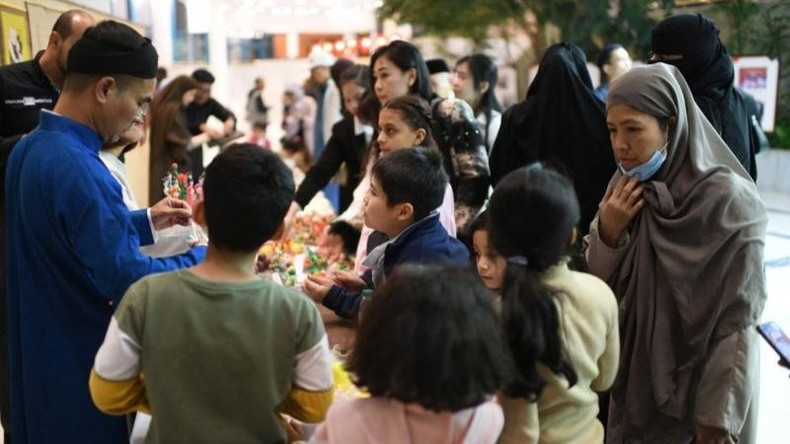 El juguete tradicional vietnamita de to he trae alegría al público de Oriente Medio de todas las edades. (Foto: Comité Organizador)
