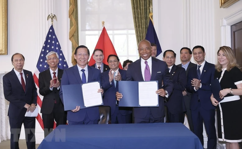 En la ceremonia de firma. (Foto: VNA) En la ceremonia de firma. (Foto: VNA)