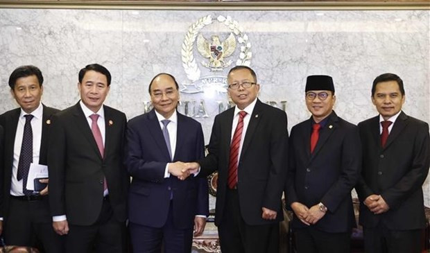 El presidente de Vietnam, Nguyen Xuan Phuc, y el titular interino de la Asamblea Consultiva del Pueblo de Indonesia, Arsul Sani. (Fotografía:VNA) El presidente de Vietnam, Nguyen Xuan Phuc, y el titular interino de la Asamblea Consultiva del Pueblo de Indonesia, Arsul Sani. (Fotografía:VNA)