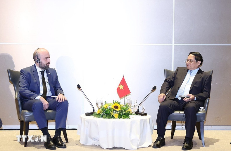 El primer ministro de Vietnam, Pham Minh Chinh, en la reunión con Márcio Rodrigues, director financiero del Grupo JBS.