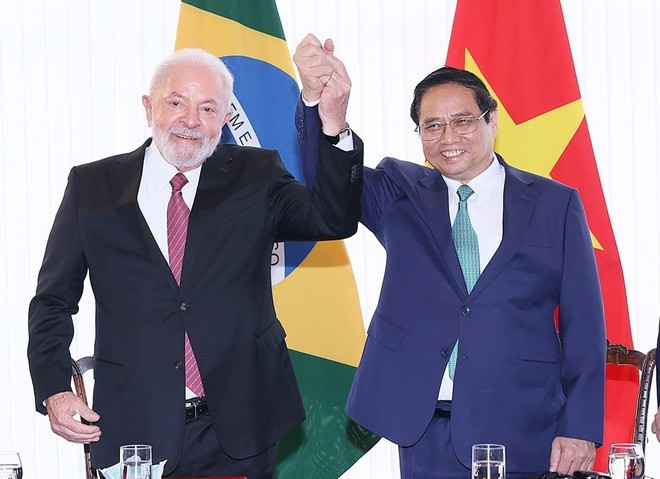 El primer ministro vietnamita, Pham Minh Chinh, y el presidente brasileño Luiz Inácio Lula da Silva. (Fotografía: VNA) El primer ministro vietnamita, Pham Minh Chinh, y el presidente brasileño Luiz Inácio Lula da Silva. (Fotografía: VNA)