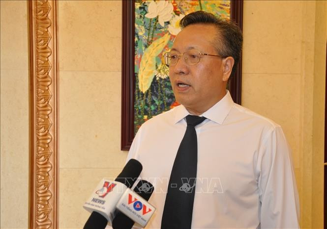 Hu Suojin, exconsejero comercial de la Embajada de China en Vietnam, en la entrevista. (Fotografía: VNA) Hu Suojin, exconsejero comercial de la Embajada de China en Vietnam, en la entrevista. (Fotografía: VNA)