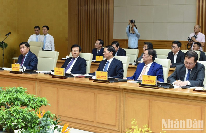 Delegados vietnamitas acuden al coloquio.