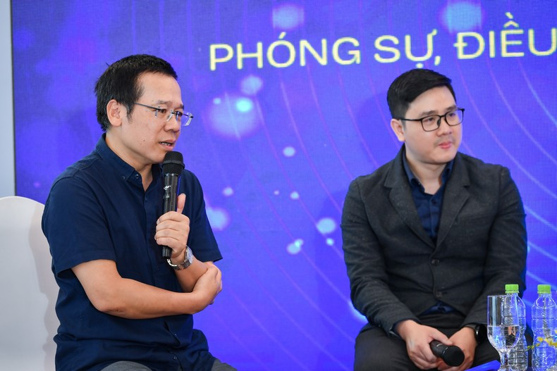 El periodista Do Doan Hoang (izq.) El periodista Do Doan Hoang (izq.)