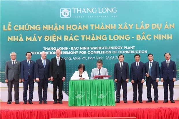 En la ceremonia que marcó la finalización del proyecto de la planta de conversión de residuos en energía de Thang Long - Bac Ninh. (Foto: VNA) En la ceremonia que marcó la finalización del proyecto de la planta de conversión de residuos en energía de Thang Long - Bac Ninh. (Foto: VNA)