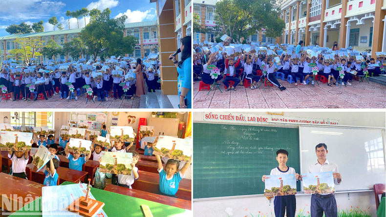 Los estudiantes están emocionados por elaborar el modelo a escala de la Torre de la Bandera de Hanói a partir del suplemento del periódico Nhan Dan. Los estudiantes están emocionados por elaborar el modelo a escala de la Torre de la Bandera de Hanói a partir del suplemento del periódico Nhan Dan.