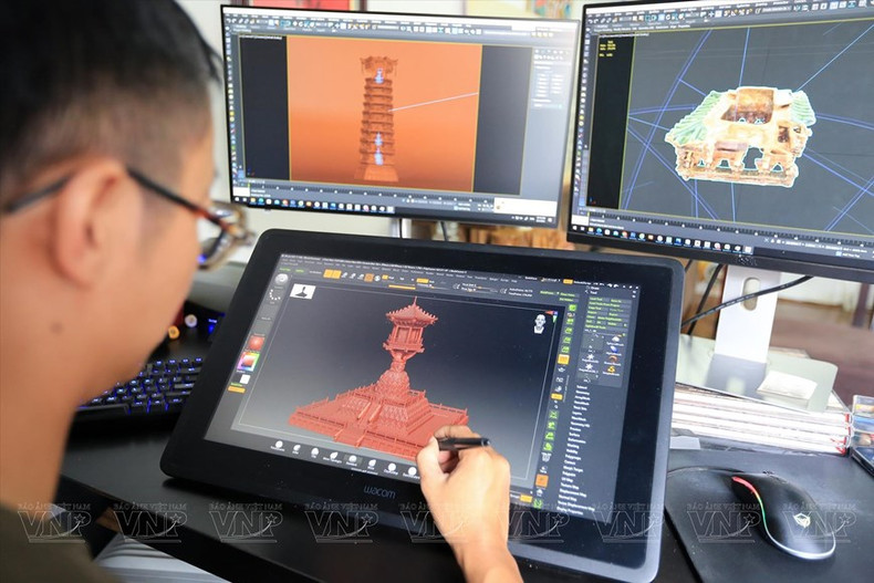 El arquitecto Dinh Viet Phuong utilizó la tecnología 3D para digitalizar dibujos de algunos productos culturales budistas. (Fuente:VNA) El arquitecto Dinh Viet Phuong utilizó la tecnología 3D para digitalizar dibujos de algunos productos culturales budistas. (Fuente:VNA)