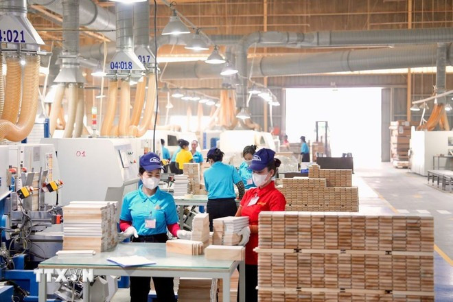 Italy-Asia Door Technology Co., Ltd. inició la producción a principios de año con mil trabajadores presentes en la fábrica de la ciudad de Tan Uyen, provincia de Binh Duong. (Foto: VNA) Italy-Asia Door Technology Co., Ltd. inició la producción a principios de año con mil trabajadores presentes en la fábrica de la ciudad de Tan Uyen, provincia de Binh Duong. (Foto: VNA)