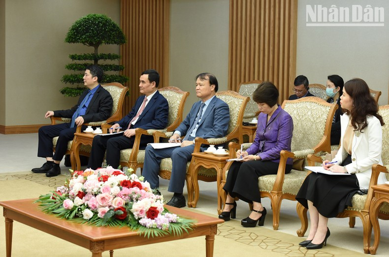 Representantes de los ministerios y sectores de Vietnam en el encuentro.