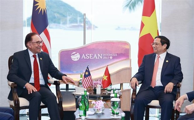 El primer ministro de Vietnam, Pham Minh Chinh, con su homólogo malasio, Anwar Ibrahim. (Foto: VNA) El primer ministro de Vietnam, Pham Minh Chinh, con su homólogo malasio, Anwar Ibrahim. (Foto: VNA)