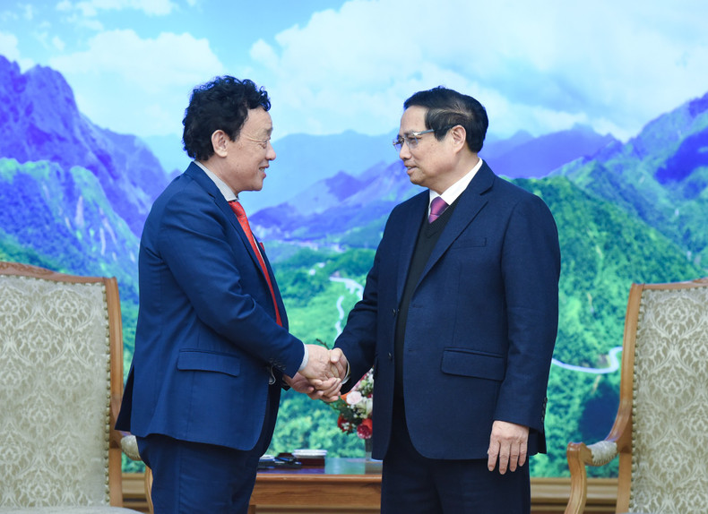 El primer ministro vietnamita, Pham Minh Chinh (derecha), recibe al director general de la FAO, Qu Dongyu. El primer ministro vietnamita, Pham Minh Chinh (derecha), recibe al director general de la FAO, Qu Dongyu.