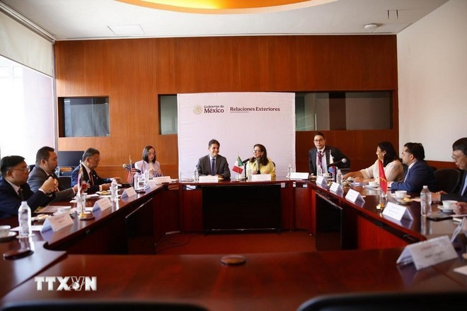 En la reunión (Foto: VNA) En la reunión (Foto: VNA)