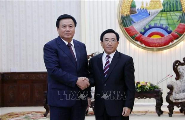 Nguyen Xuan Thang (izquierda), miembro del Buró Político y director de la Academia Nacional de Política Ho Chi Minh, y el primer ministro de Laos, Phankham Viphavanh. (Fotografía: VNA) Nguyen Xuan Thang (izquierda), miembro del Buró Político y director de la Academia Nacional de Política Ho Chi Minh, y el primer ministro de Laos, Phankham Viphavanh. (Fotografía: VNA)