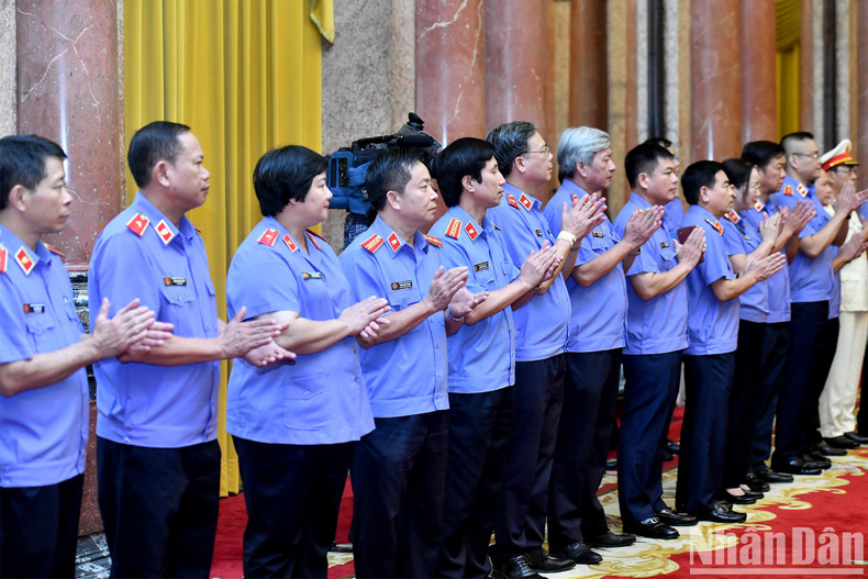 Los delegados al acto. Los delegados al acto.