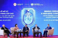 Escena del simposio. (Foto: VNA)