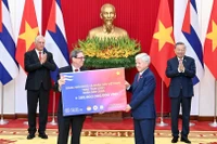 [Foto] Dirigentes partidistas de Vietnam y Cuba presencian intercambio de firmas de documentos de cooperación binacional