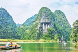 En el Complejo Paisajístico de Trang An, Ninh Binh. (Foto: Nhan Dan)