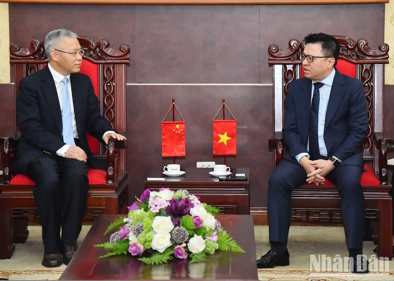 Quoc Minh y Hu Zhaoming en la recepción.