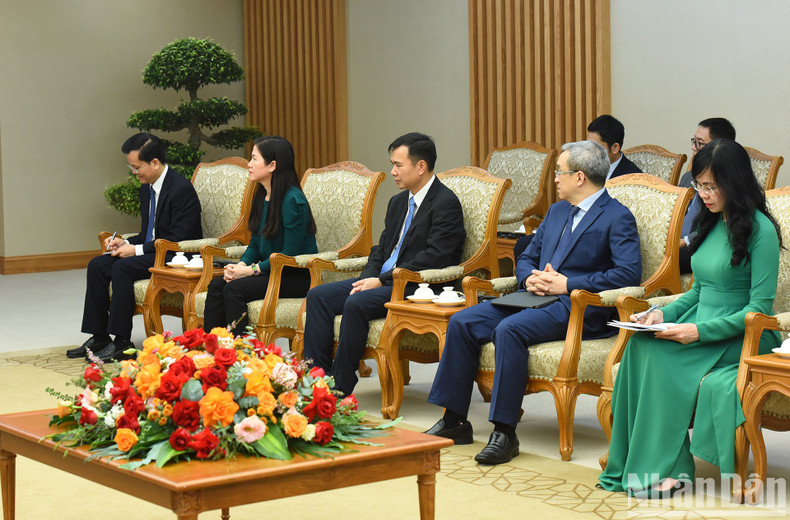 Delegados vietnamitas asistentes al evento.