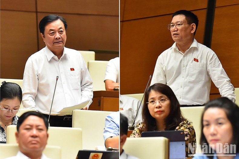 El ministro de Agricultura y Desarrollo Rural, Le Minh Hoan, y el ministro de Finanzas, Ho Duc Phoc, explican temas de interés para los parlamentarios.