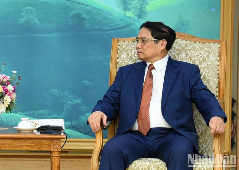 [Foto] Premier vietnamita recibe al enviado presidencial especial de EE.UU. para el Clima ảnh 3