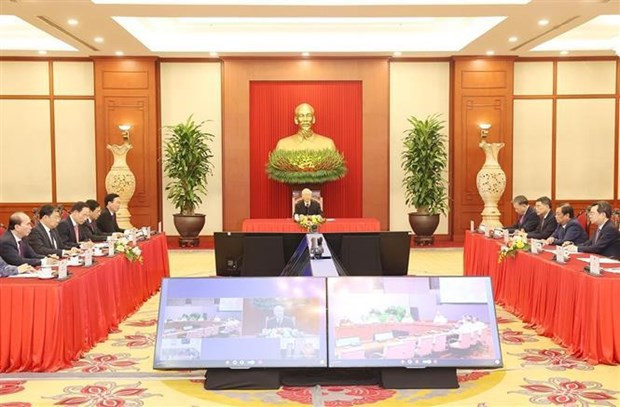 Los dos dirigentes aplaudieron la buena marcha de las relaciones entre los dos Partidos y países (Fotografía: VNA)