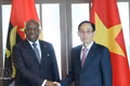 El ministro de Relaciones Exteriores de Vietnam, Le Hoai Trung y su par de Angola, Téte António (Fuente: VNA)