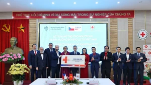 En el acto. (Foto: VNA)