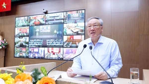El vice primer ministro permanente de Vietnam, Nguyen Hoa Binh, interviene en la conferencia. (Fotografía: VNA)