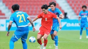 En el partido. (Foto: VNA)