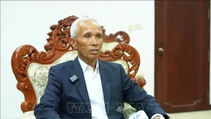 El jefe de la Comisión de Propaganda y Educación del Comité Central del Partido Popular Revolucionario de Laos, Khamphanh Pheuyavong. (Fotografía: VNA)