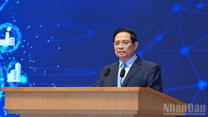 El primer ministro de Vietnam, Pham Minh Chinh, interviene en el evento. (Foto: Nhan Dan)