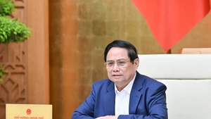 El primer ministro de Vietnam, Pham Minh Chinh, interviene en la reunión. (Foto: Nhan Dan)