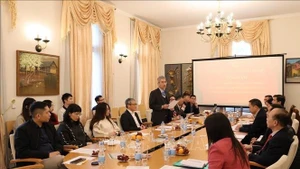 En el seminario. (Foto: VNA)