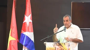 El ministro cubano de Agricultura, Ydael Pérez Brito, habla en el evento. (Foto: VNA)