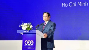 El primer ministro de Vietnam, Pham Minh Chinh, interviene en la cita. (Foto: VNA)