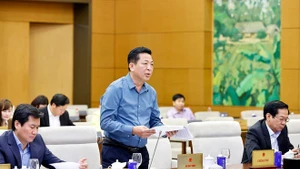 El ministro de Construcción, Tran Hong Minh, habla en la cita. (Foto: VNA)