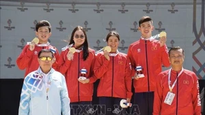 Nguyen Huy Hoang, Vo Thi My Tien, Nguyen Kha Nhi y Mai Tran Tuan Anh ganan la medalla de oro. (Foto: VNA)