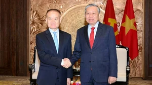 [Foto] Líder partidista de Vietnam recibe a enviado especial del máximo dirigente chino