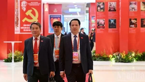 [Foto] Delegados asisten a la sesión inaugural del XIV Congreso Nacional del Partido Comunista de Vietnam