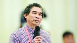 El profesor asociado y doctor Nguyen Thuong Lang del Instituto de Comercio Internacional y Economía, Universidad Nacional de Economía. (Foto: https://moit.gov.vn/)
