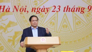 El primer ministro vietnamita, Pham Minh Chinh, preside la 14ª reunión del Comité Directivo Nacional para la lucha contra la pesca ilegal, no declarada y no reglamentada. (Foto: VNA)