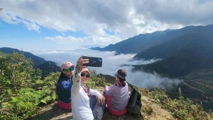 Visitantes en Mu Cang Chai. (Foto: VNA)