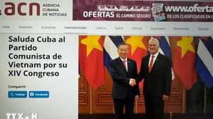 La agencia cubana de noticias ACN informa sobre el XIV Congreso del Partido Comunista de Vietnam. (Foto: VNA)