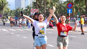 Atletas extranjeras participan con entusiasmo en el evento. (Foto: VNA)