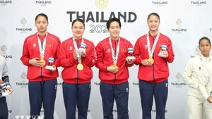 Los atletas vietnamitas mantienen actuaciones destacadas en los SEA Games 33. (Foto: VNA)