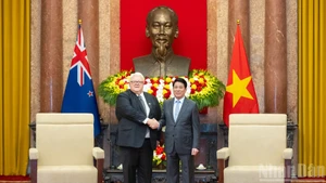 El presidente de Vietnam, Luong Cuong, y el titular del Parlamento de Nueva Zelanda, Gerry Brownlee.
