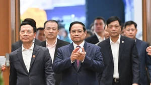 [Foto] Conferencia para revisar un año de implementación del programa de acción gubernamental según Resolución nº 57